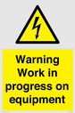 warning-work-in-progress-on-equipmentwith-electrical-hazard-symbol~